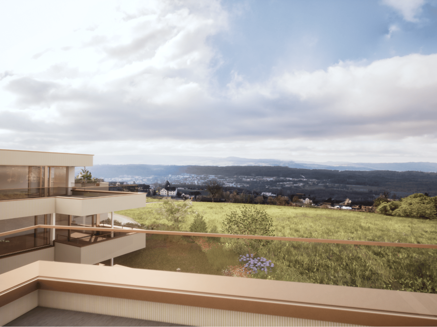 Balcony with a view overlooking a hilly, grassy landscape with a town in the distance. The apartment building has a modern, minimalist design with large windows and a terrace.