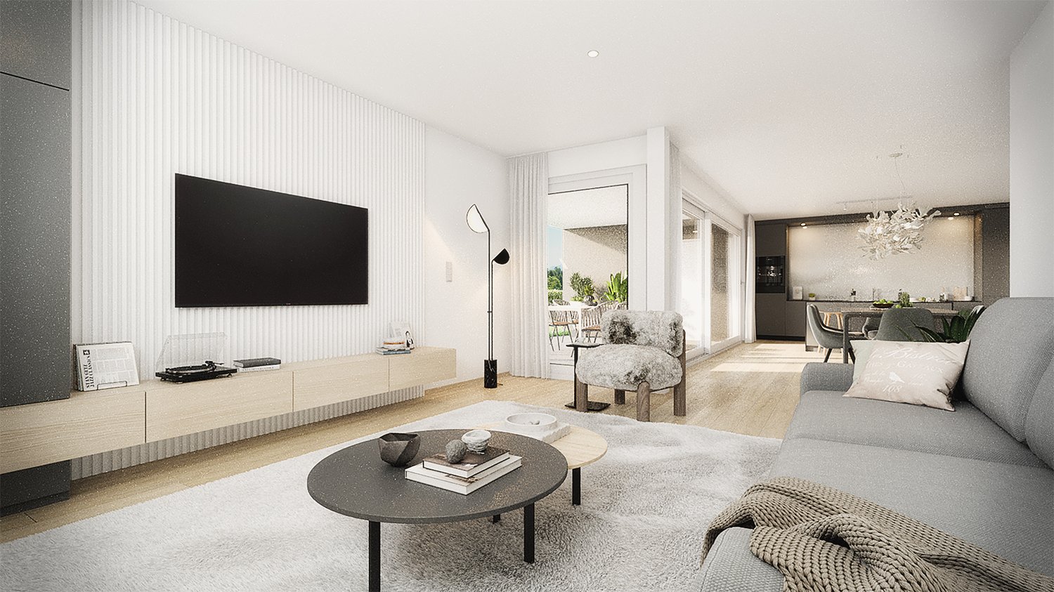 Modern interior with living room, dining room, and kitchen area. Features a large flat screen TV, a round table, a couch, a chair, and white flooring.