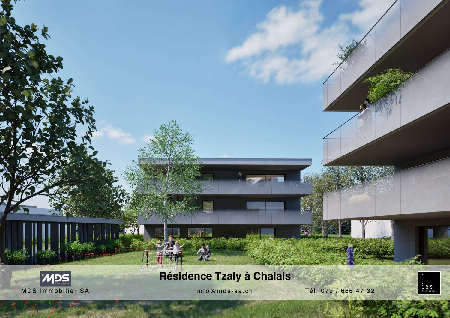 Modern multi-story apartment building with balconies, surrounded by lush greenery and trees. The building has a sleek, contemporary design with large windows and a mix of glass and dark exterior materials. There are people sitting on benches in the grassy