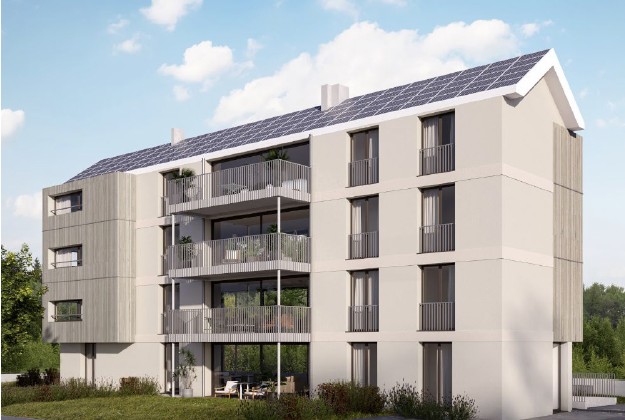 4 story apartment building, white exterior, balconies, solar panels on roof