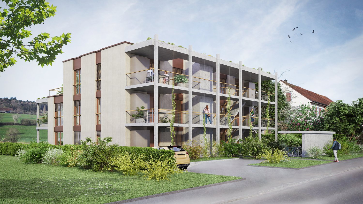 A modern, multi-story apartment building with balconies and a parking area in front. The building has a clean, minimalist design with a mix of light and dark colors. The surrounding landscape includes green grass, trees, and a paved walkway.
