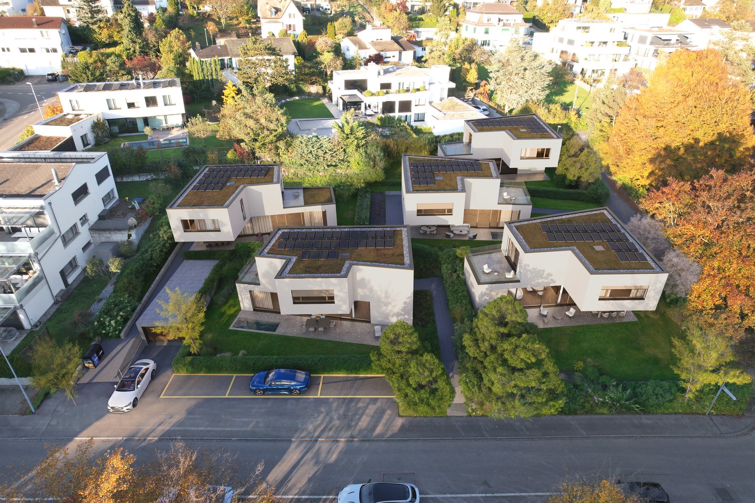 modern architecture with solar panels, balconies, swimming pools, parking area, and lush green surroundings