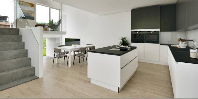 white cabinets, black countertop, island, dining table, chairs, oven, TV