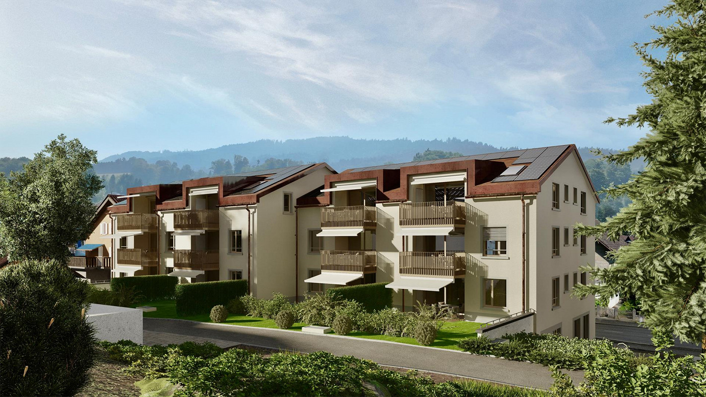 Three story residential building, solar panels, white and brown walls, balconies, fenced garden