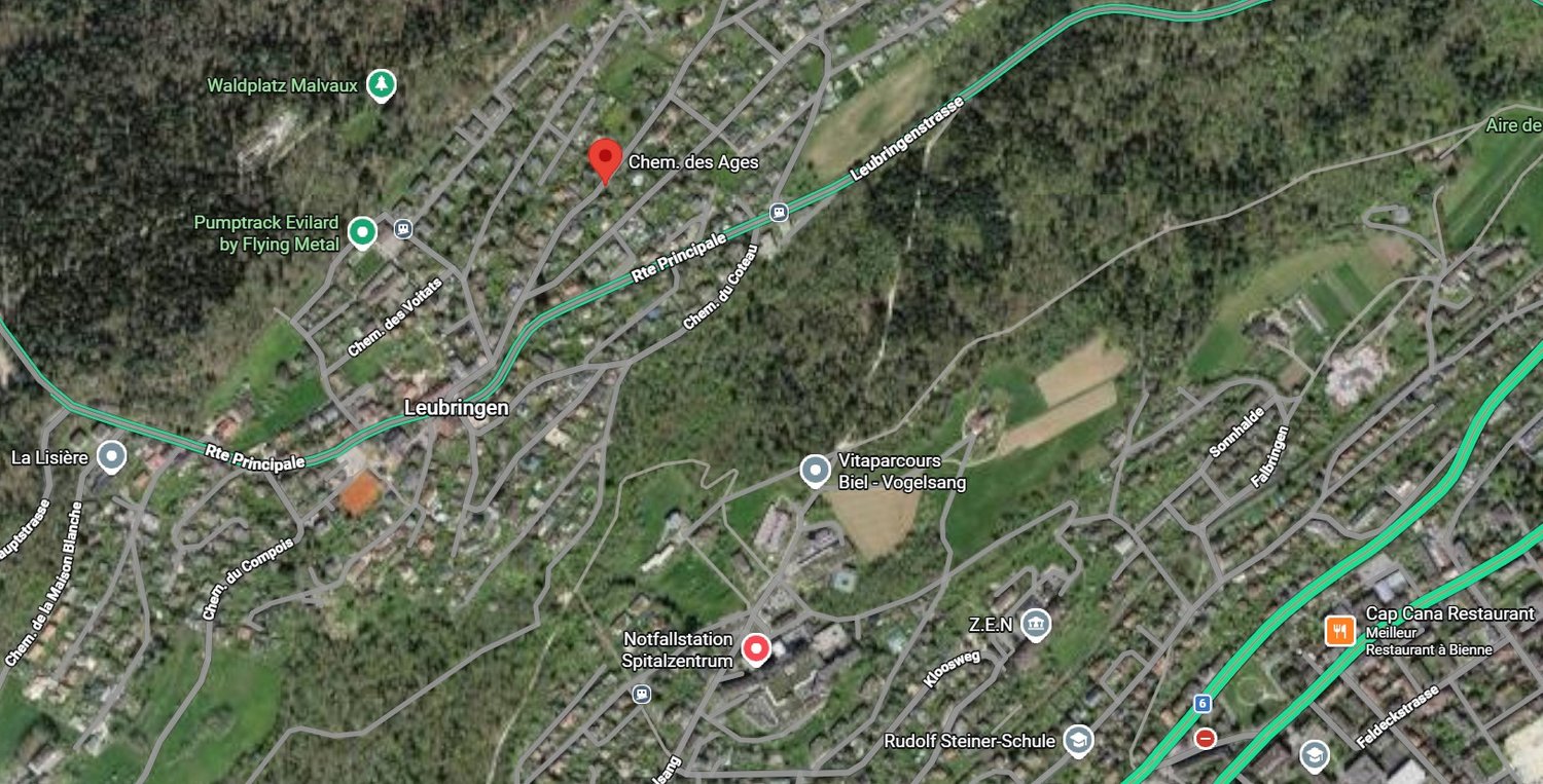 Aerial map of a town with roads, buildings, and landmarks