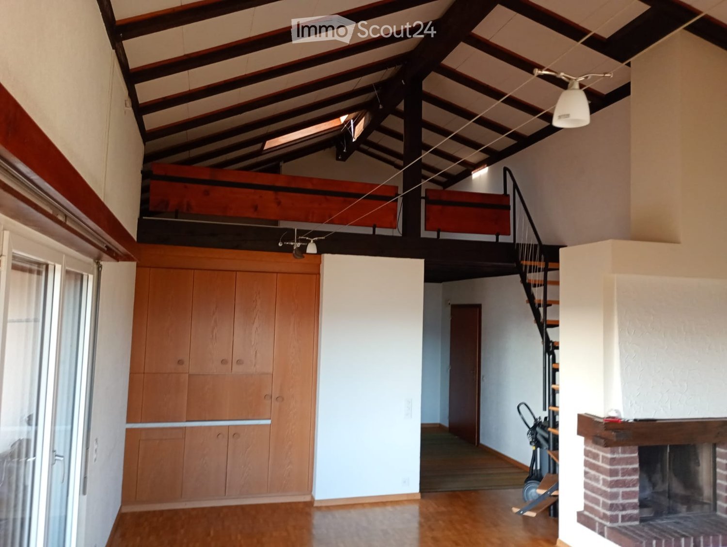 wooden cabinet, fireplace, wooden ceiling, stairs
