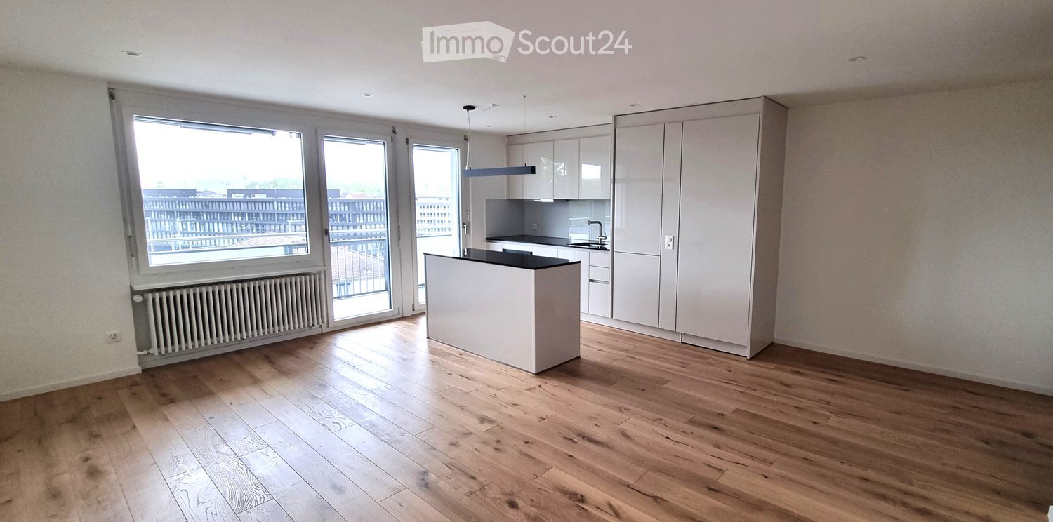 Open kitchen, wooden floor, glass sliding doors, window, radiator