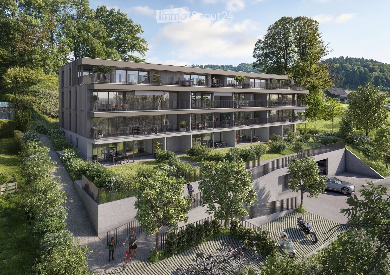 Multi-story building with multiple balconies and terraces, underground parking area, bicycles parked in the parking area, greenery in the surroundings