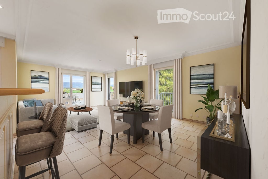Dining room with round table, chairs, chandelier, TV, couch, balcony, windows, paintings, plant