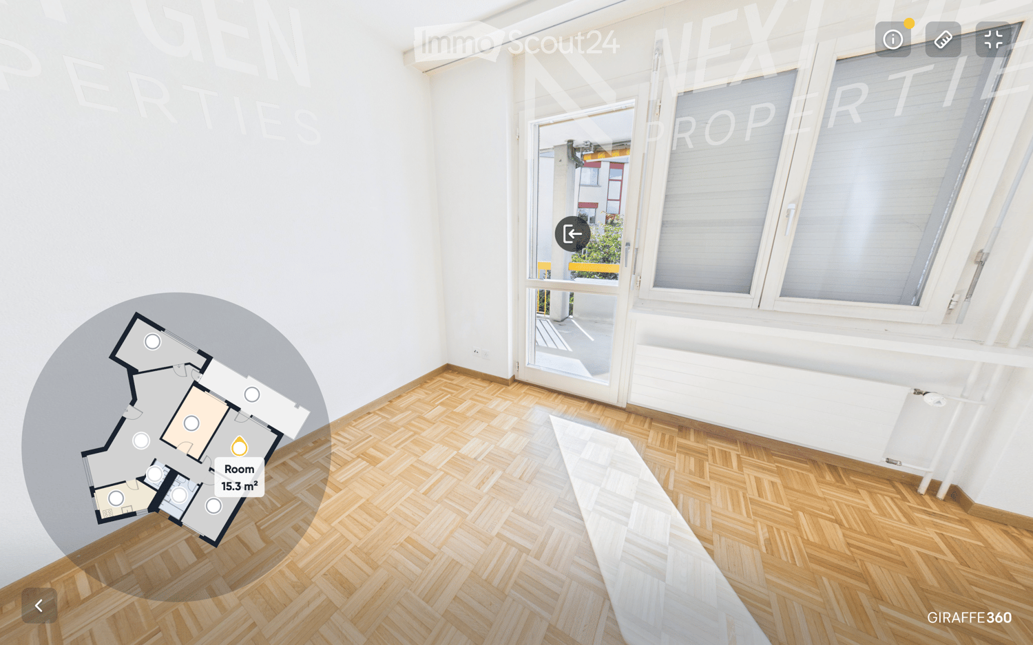 Empty room with wooden herringbone flooring, white walls, large windows, and a sliding glass door leading to a balcony.