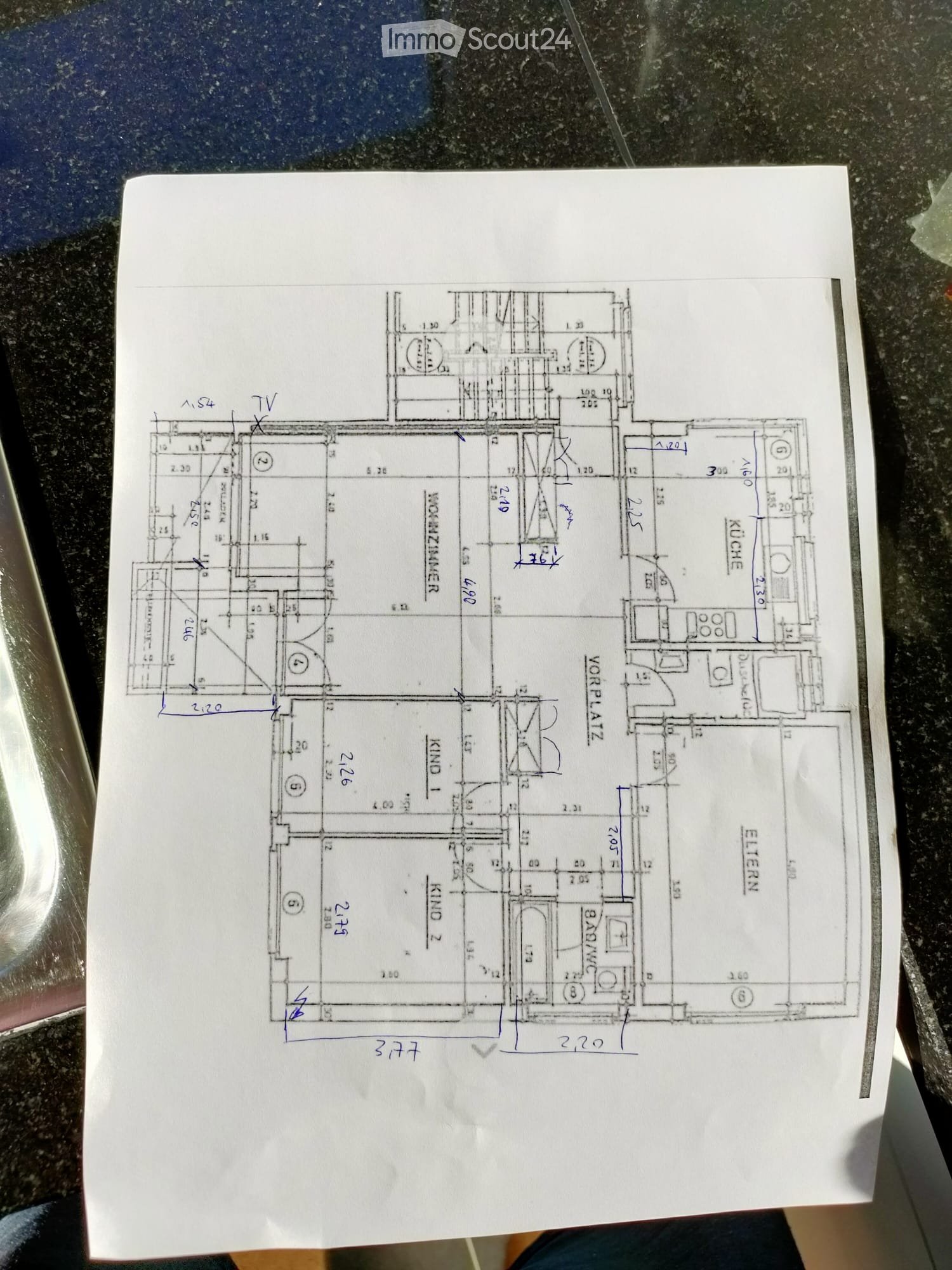 Floor plan of a residential space showing multiple rooms including a living room, kitchen, bedrooms, and bathrooms. Dimensions and room labels are visible.