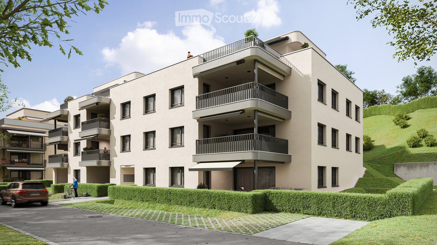 Modern multi-story residential building with balconies, large windows, and a landscaped garden area.
