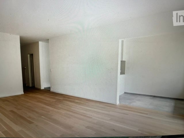 Completely empty room with bare walls and wooden floor. No furniture or equipment.