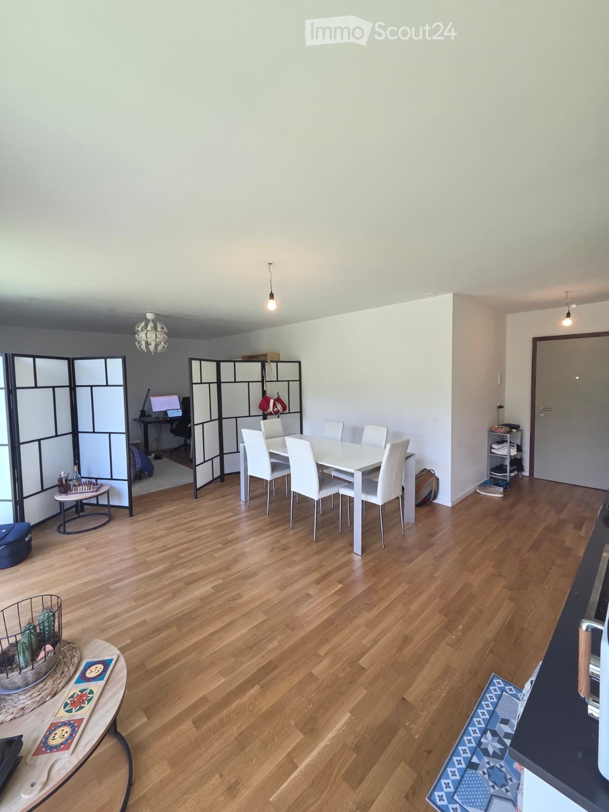 {"type": "Furnished Room", "objects": ["table", "chair", "laptop", "screen", "chair", "table", "chair", "chair", "chair", "chair", "chair", "chair", "table", "chair", "chair", "chair", "chair", "chair", "chair", "chair", "chair", "chair", "chair", "chair"