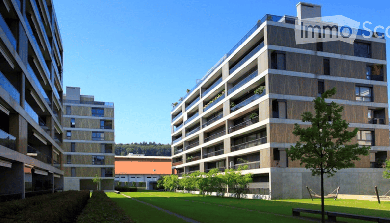 Apartment complex, modern architecture, balconies, green areas, landscaped lawn