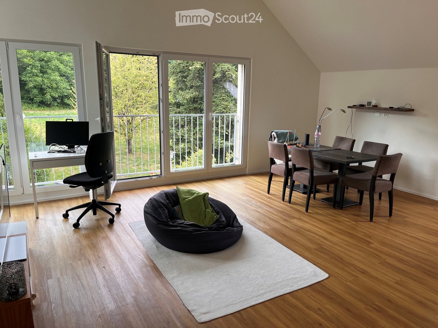 {"visible_features": ["View"], "type": "Furnished Room", "objects": ["chair", "table", "screen", "chair", "chair", "chair", "chair", "chair", "chair", "chair", "chair", "chair", "chair", "chair", "chair", "chair", "chair", "chair", "chair", "chair", "chai