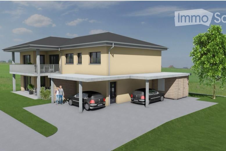 Two-story house with a modern design, featuring a garage, balcony, and parking area for two cars.