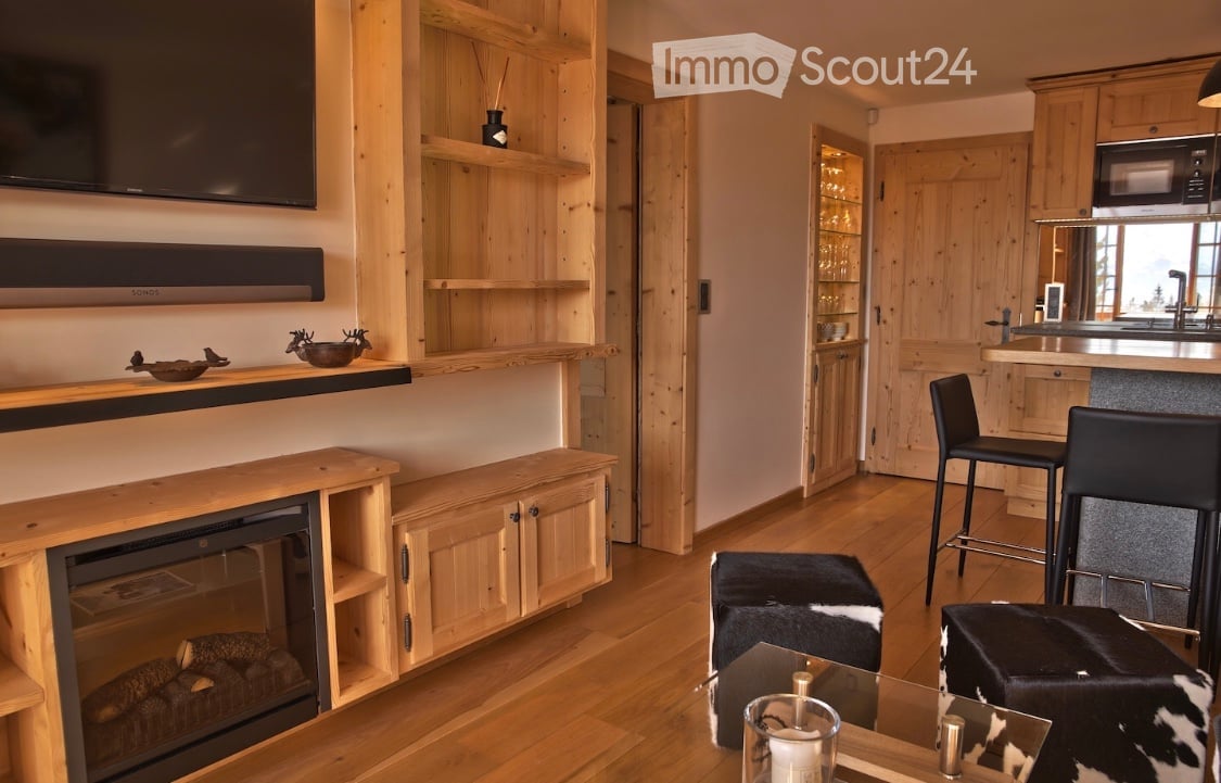 {"visible_features": ["Fireplace"], "type": "Furnished Room", "objects": ["fireplace", "sofa", "stool", "stool", "stool", "stool", "stool", "stool", "stool", "stool", "stool", "stool", "stool", "stool", "stool", "stool", "stool", "stool", "stool", "stool"