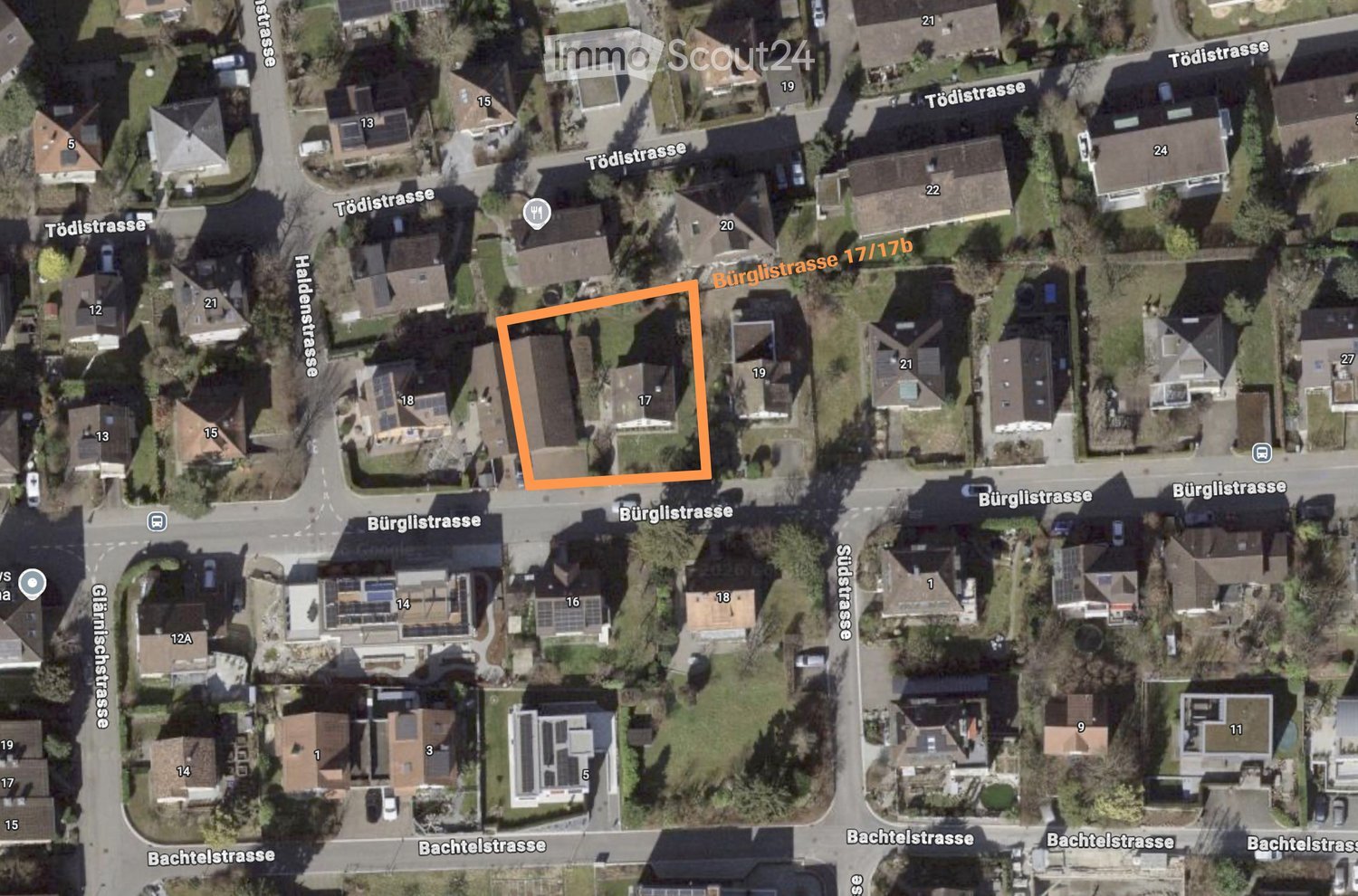 Aerial view of a residential area showing multiple houses, streets, and numbered addresses. The highlighted property is located at Bürglistrasse 17/17b, surrounded by neighboring houses and greenery.