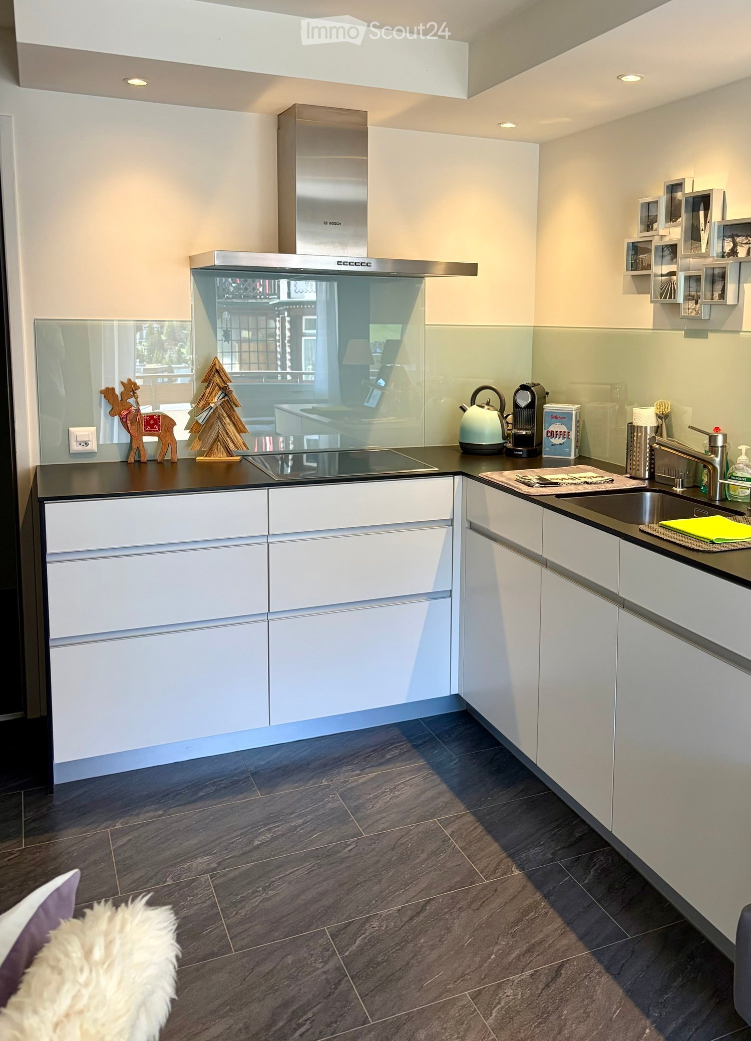 {"type": "Kitchen", "objects": ["cabinets", "sink", "faucet", "coffee maker", "teapot", "fridge", "induction stove", "fridge", "fridge", "fridge", "fridge", "fridge", "fridge", "fridge", "fridge", "fridge", "fridge", "fridge", "fridge", "fridge", "fridge"
