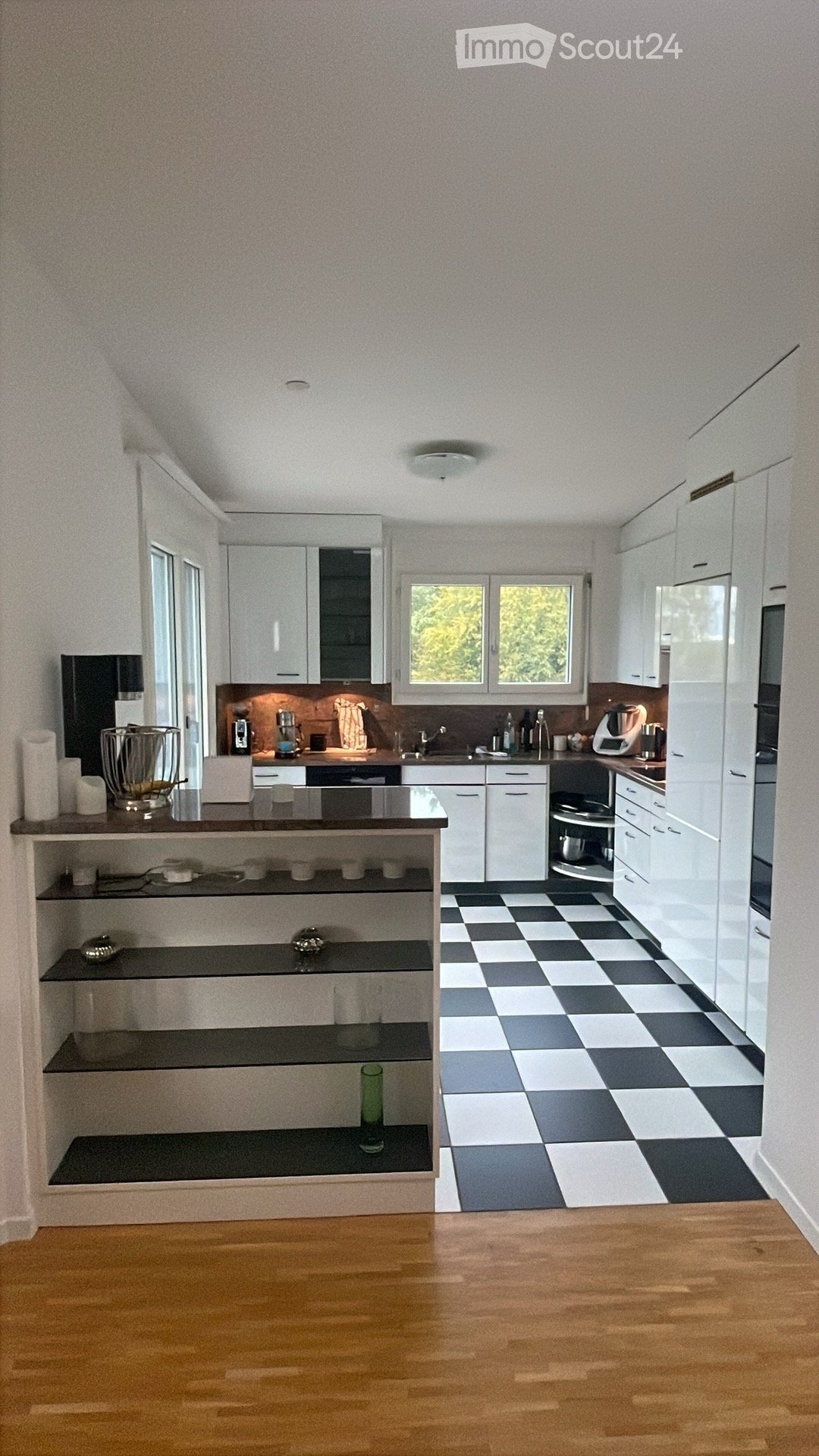 {"type": "Kitchen", "objects": ["refrigerator", "sink", "faucet", "coffee maker", "blender", "cupboard", "oven", "microwave", "cupboard", "cupboard", "cupboard", "cupboard", "cupboard", "cupboard", "cupboard", "cupboard", "cupboard", "cupboard", "cupboard