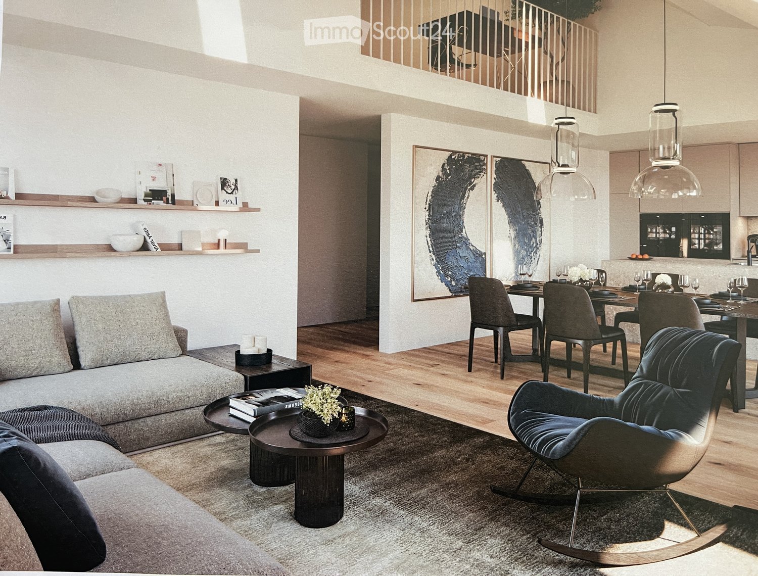 Modern living room with a grey sofa, coffee table, dining area with chairs and table, shelves with decorative items, and pendant lights.