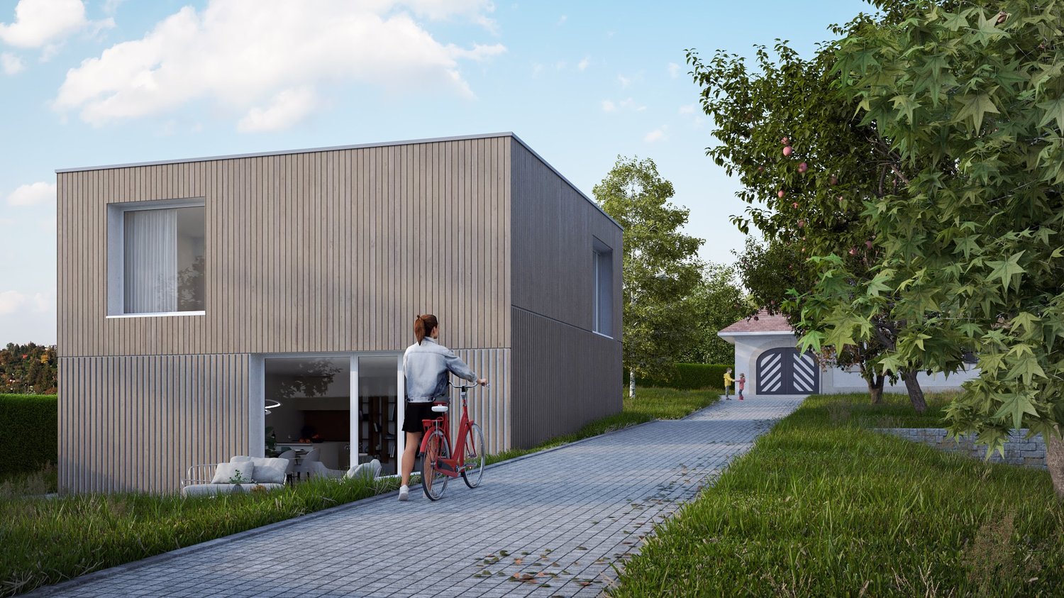 2-story modern house with gray siding, large windows, a garage, and a paved driveway leading to the house. The house is surrounded by trees and greenery, with a person on a bicycle visible in the foreground.