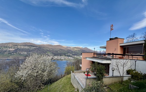 modern house, elevated, balcony, lake view, mountains