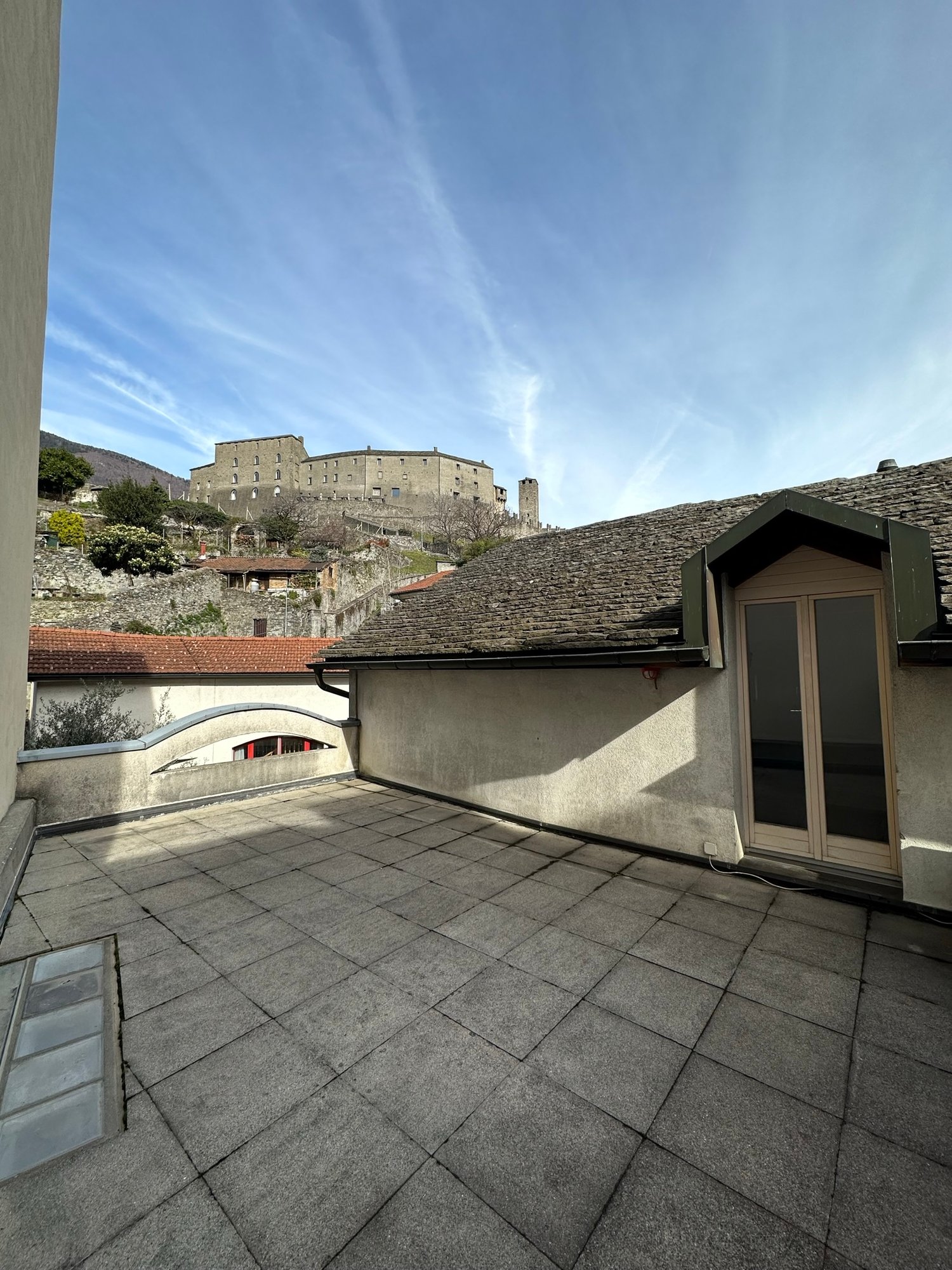Concrete paved roof, entrance to roof