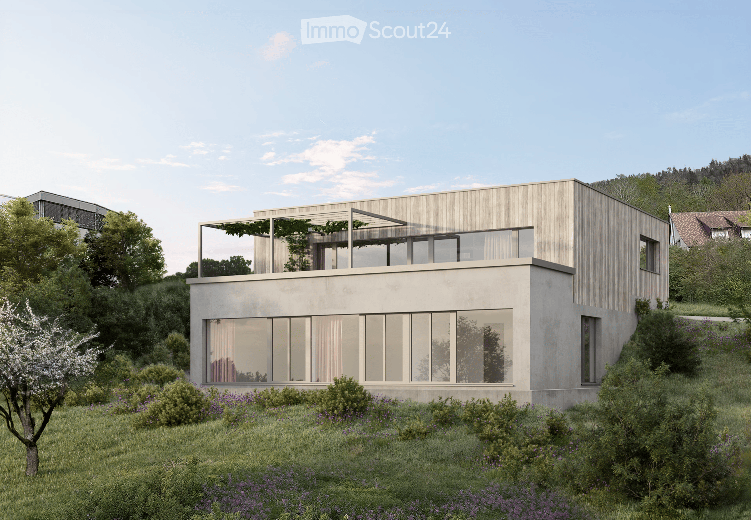 Modern two-story house with gray walls and a terrace on the second floor, large windows on the first floor