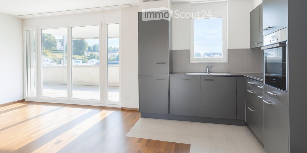 modern kitchen, hardwood floor, large windows, sliding doors to balcony, stainless steel appliances