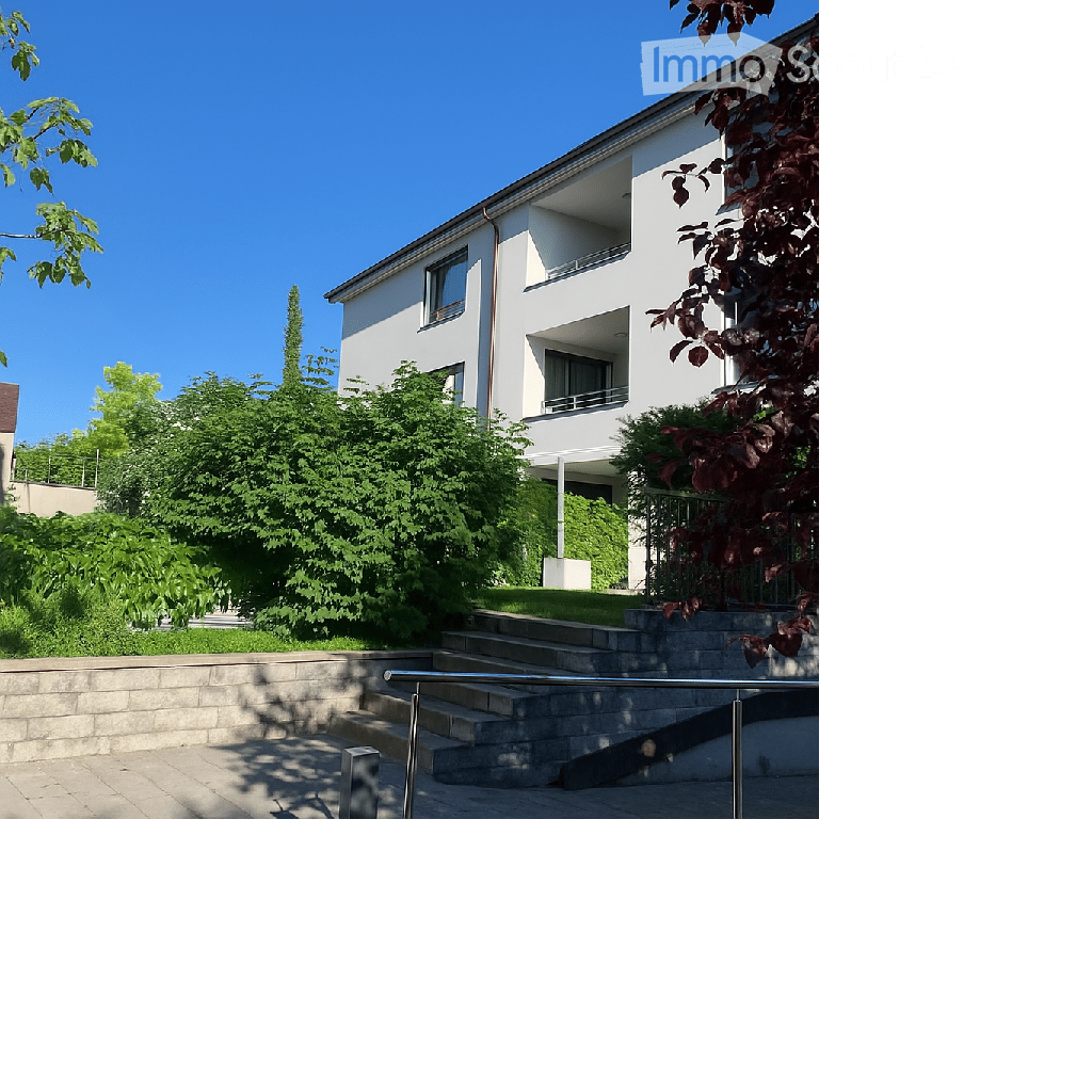 3 story house, white walls, 3 balconies, stairs leading up to the entrance