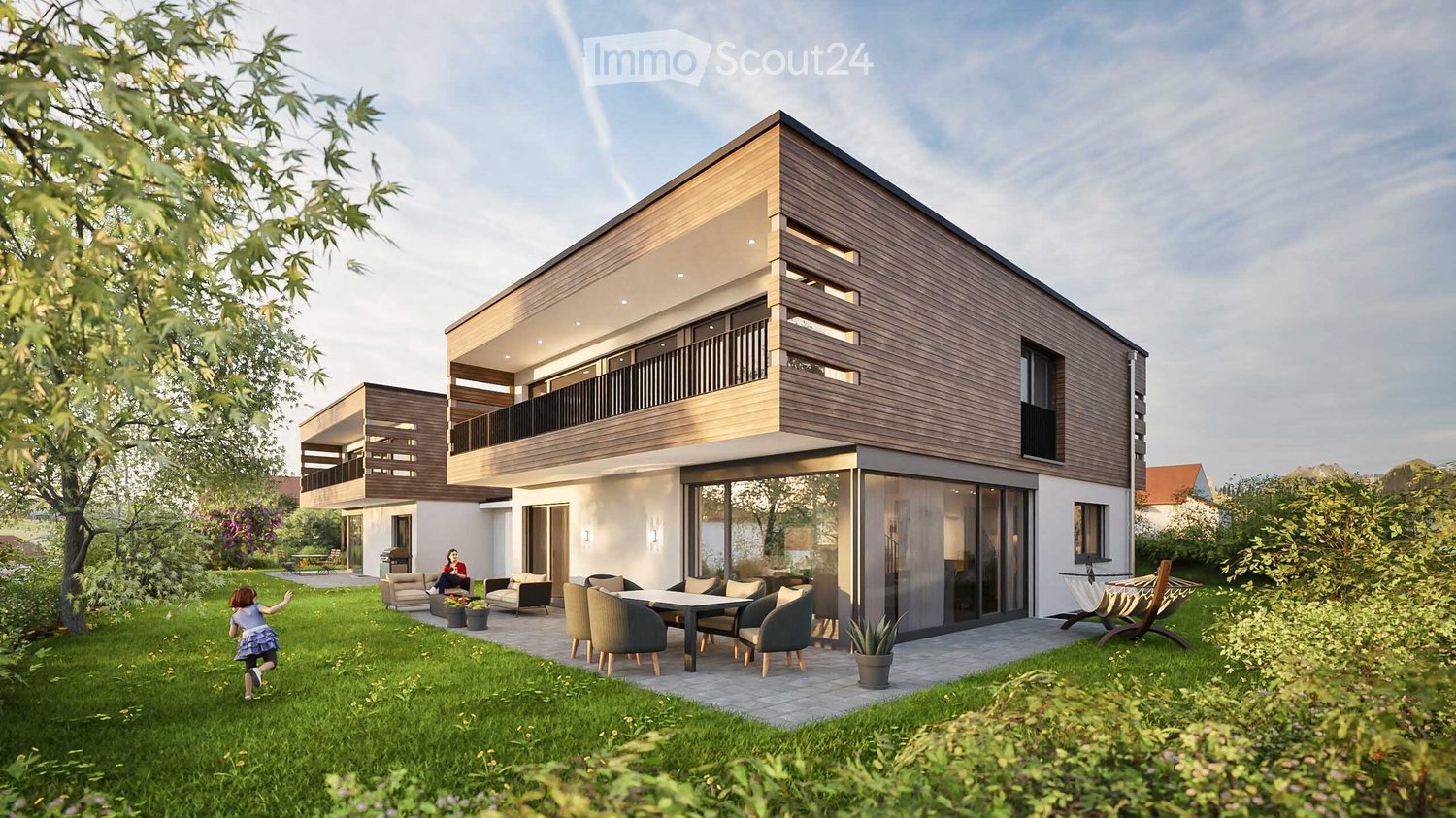 modern house with wooden exterior, double floor with balcony and glass doors, outdoor seating area with table and chairs, garden with trees and shrubs