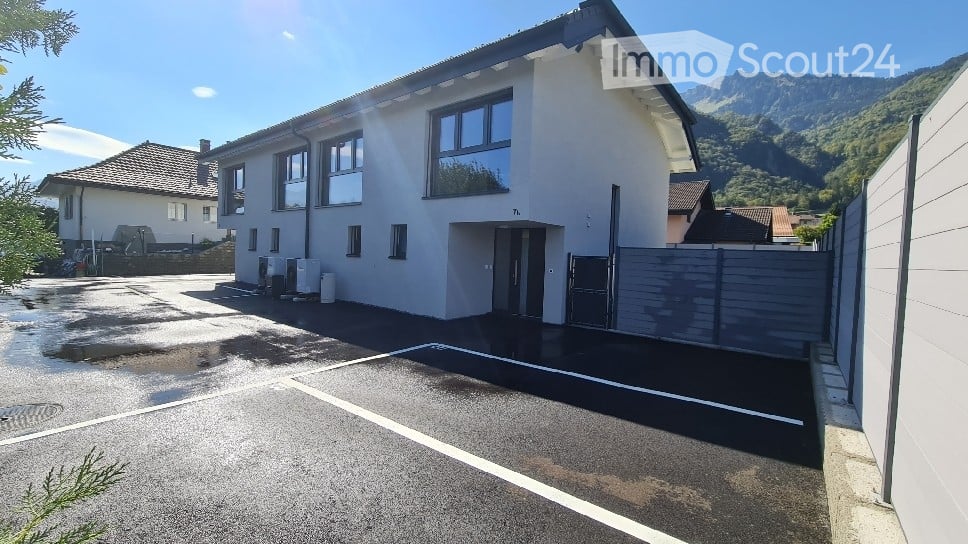 White house, 2 story, windows, 1 garage, parking lot, brown roof