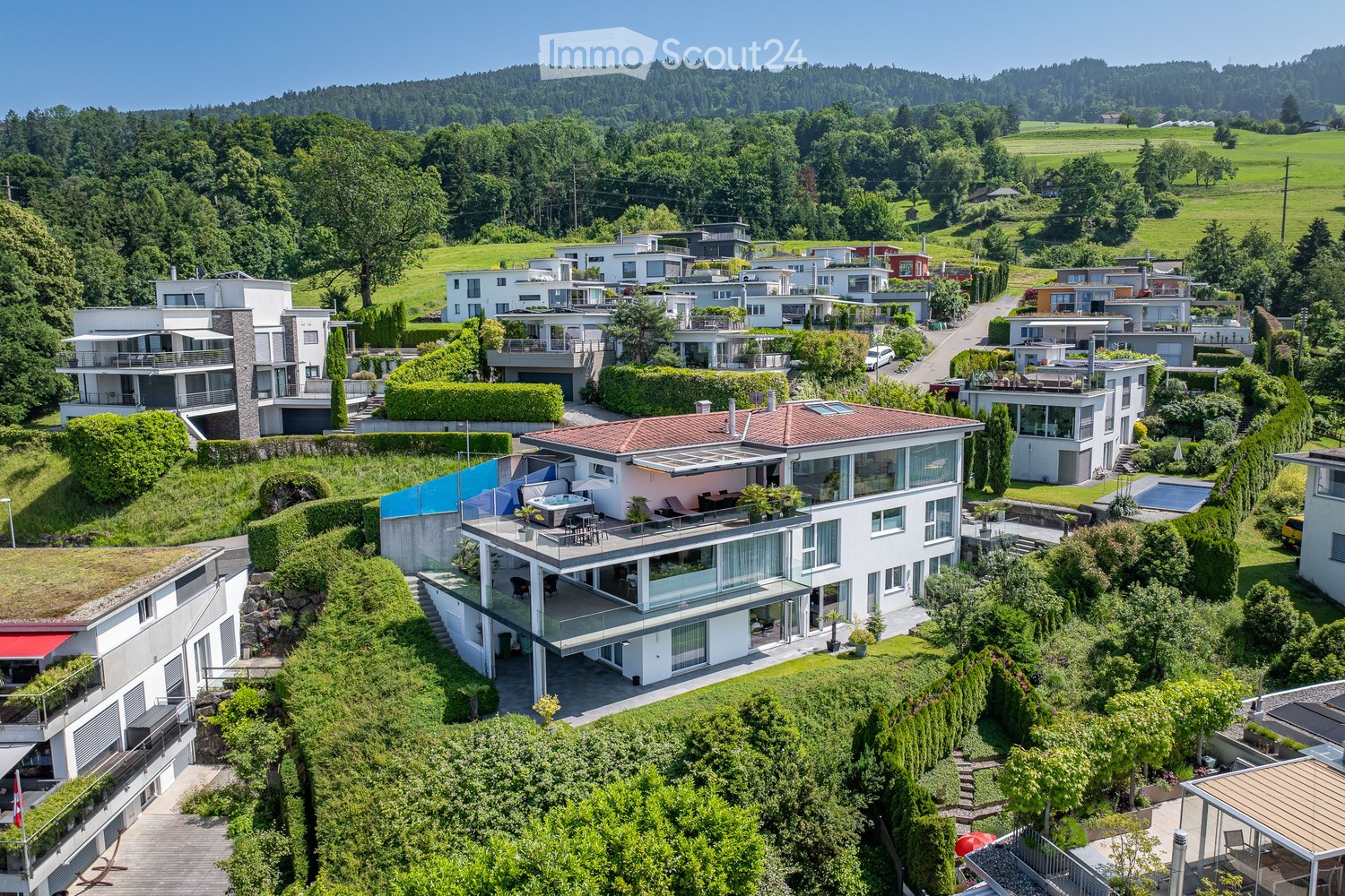 Terraced houses, each with balcony, terraces, gardens, green roofs, swimming pool