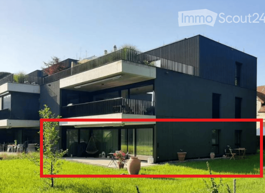 modern two-story house, black exterior, large windows, several balconies