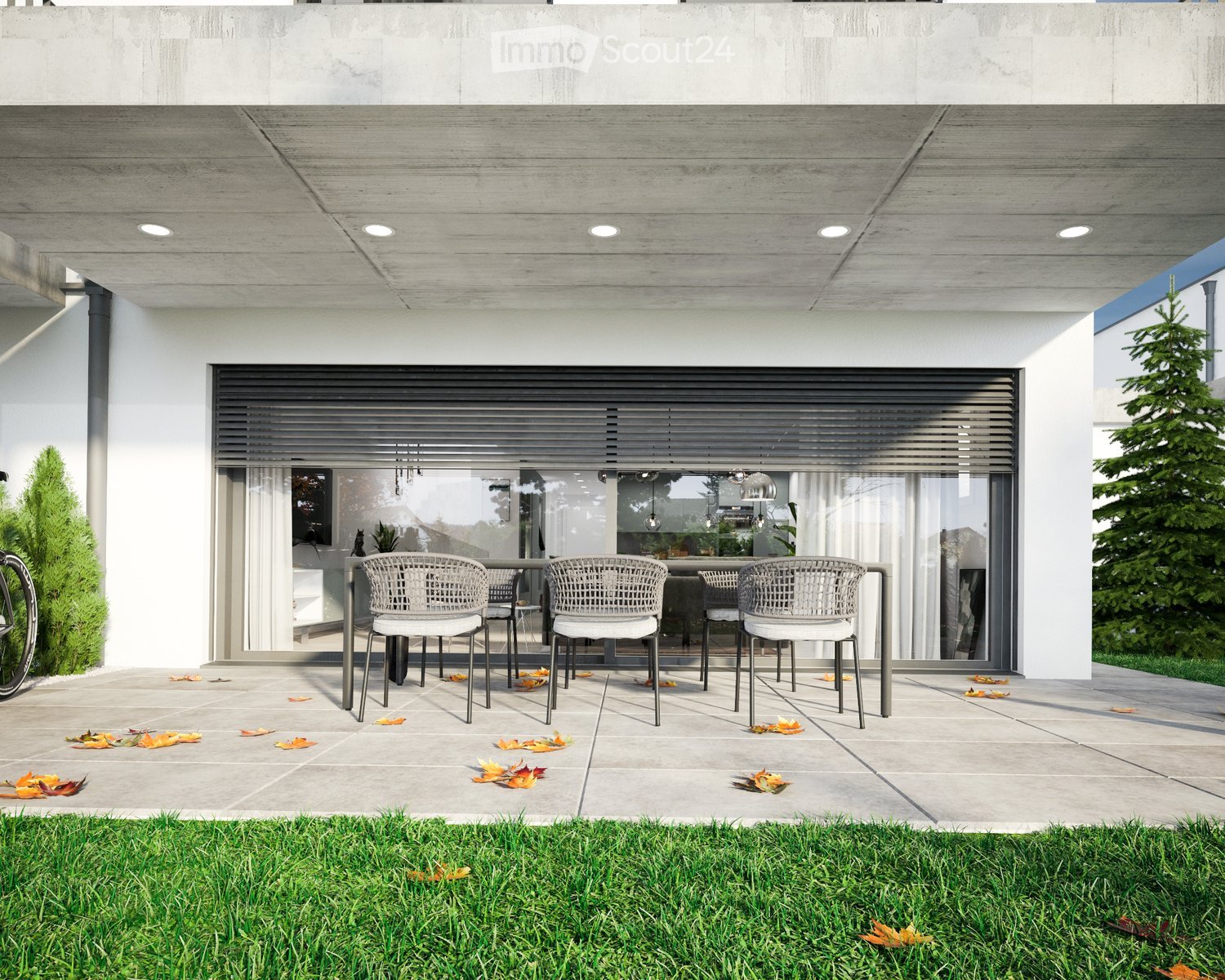 Table and chairs, metallic frame, glass doors, plants, paved floor, lawn, autumn leaves