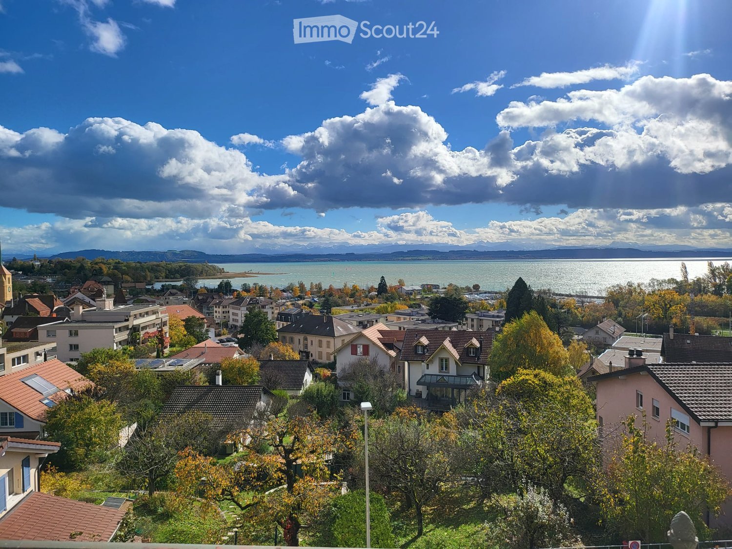 view of houses with lake in the background