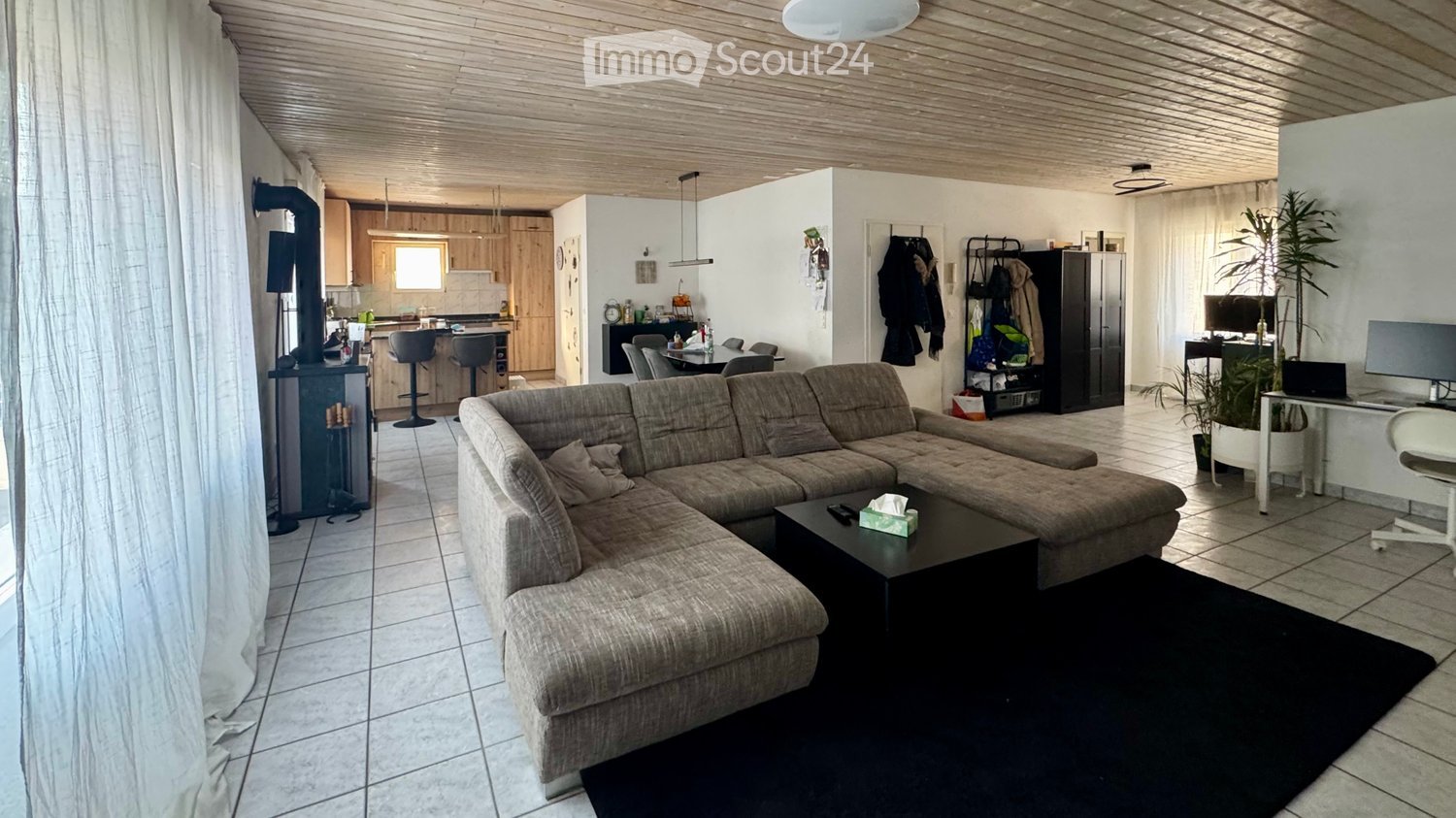 L-shaped sofa, coffee table, dining table, desk, chair, TV, wardrobe, plants