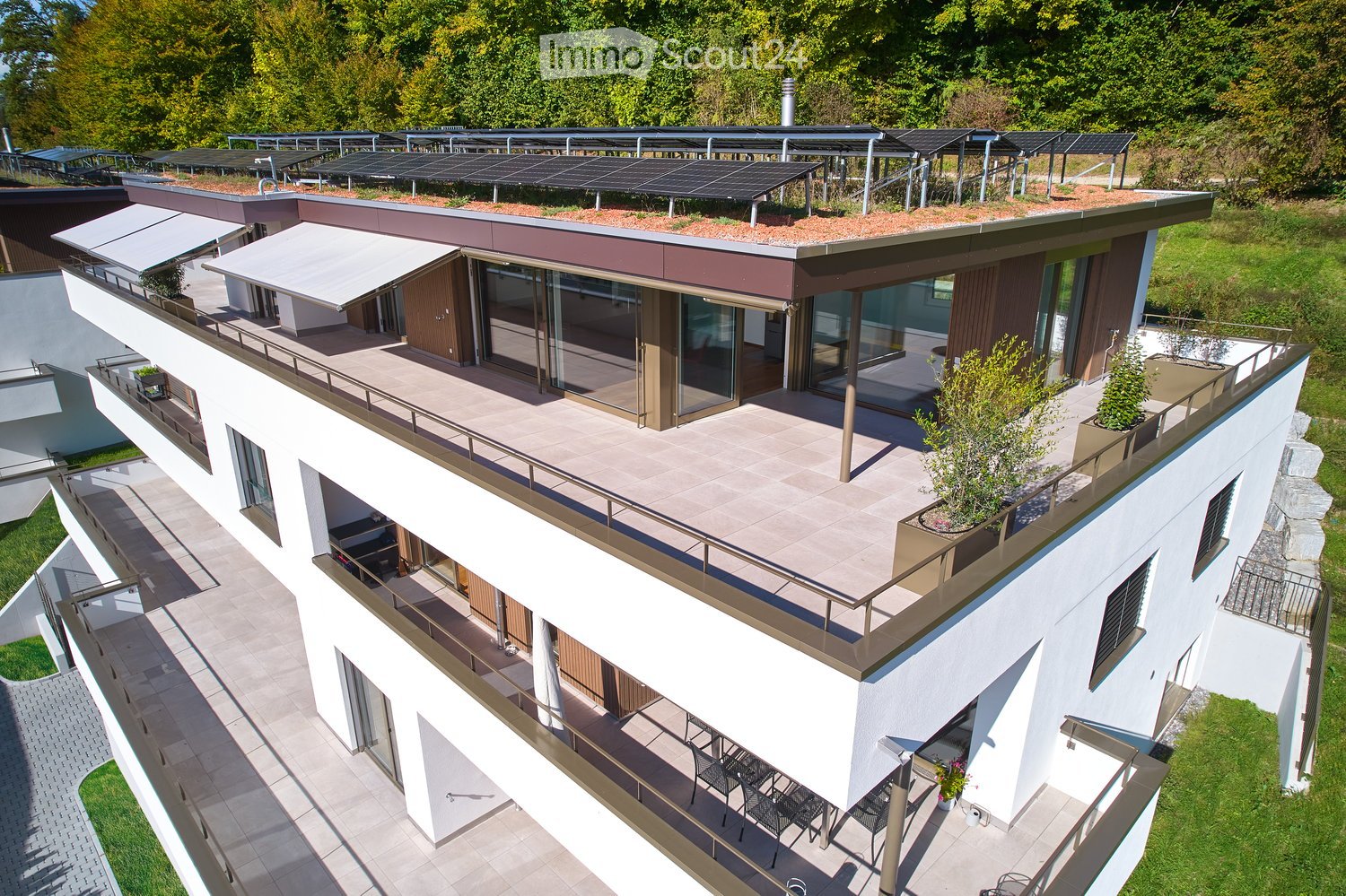 3-story modern house, rooftop solar panels, large terrace, swimming pool, and a garden