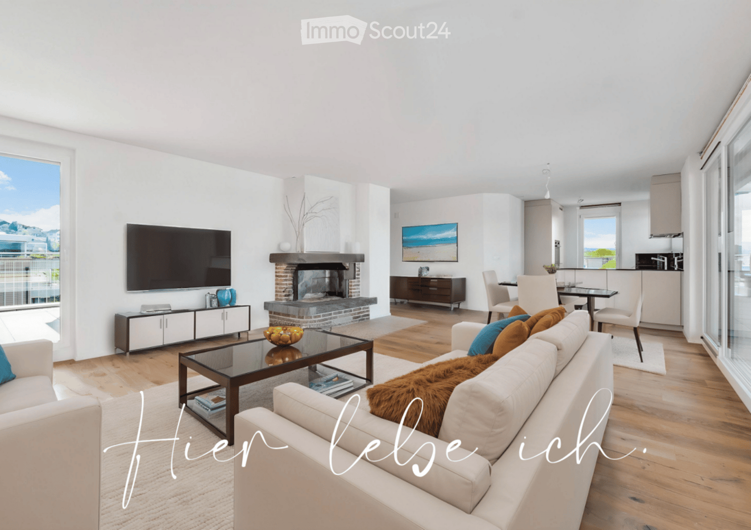 open floor plan, large windows, balcony, fireplace, flat-screen TV, sofa, coffee table, dining table, chairs