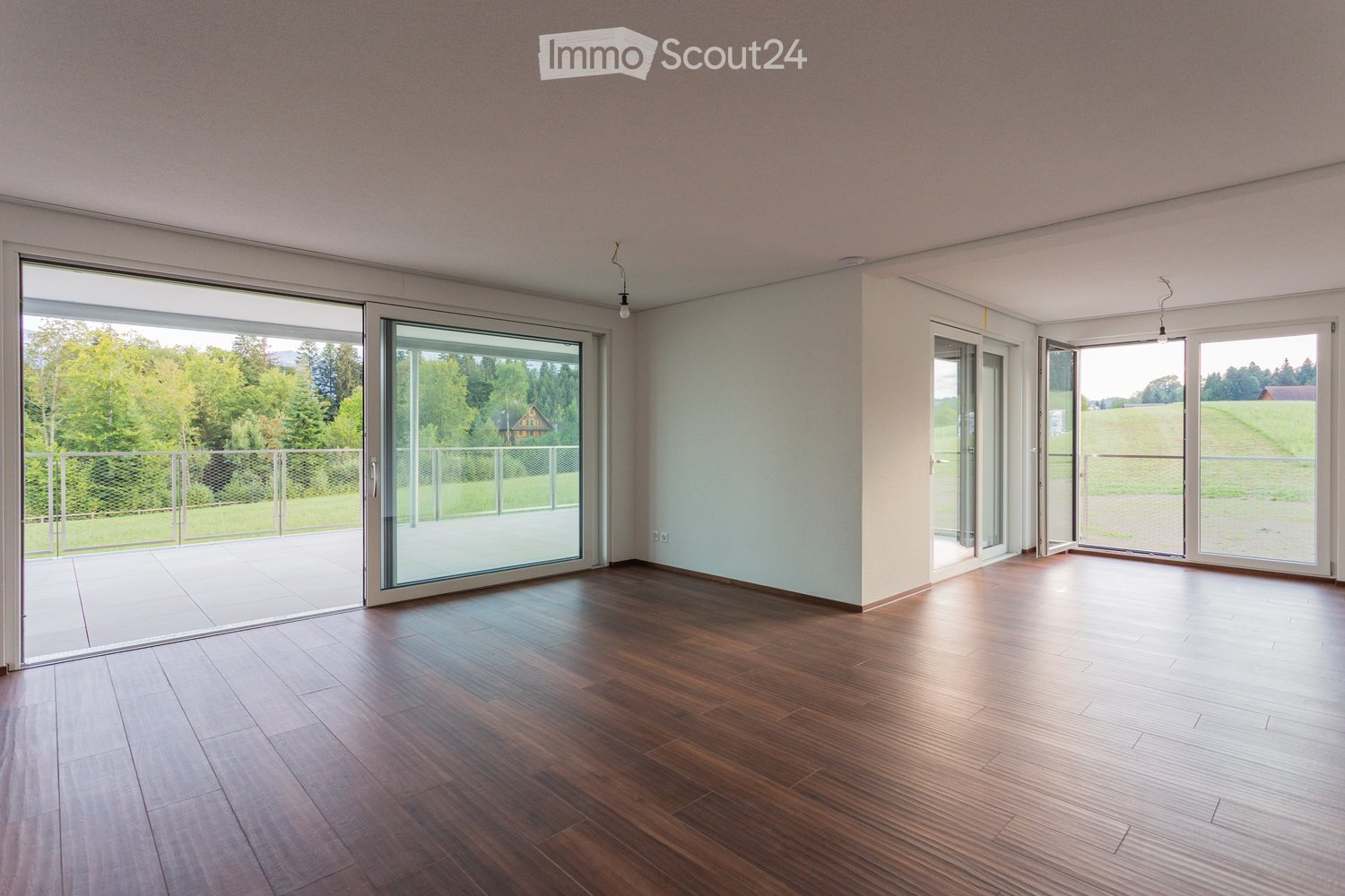 wooden floors, four large windows, balcony, panoramic view