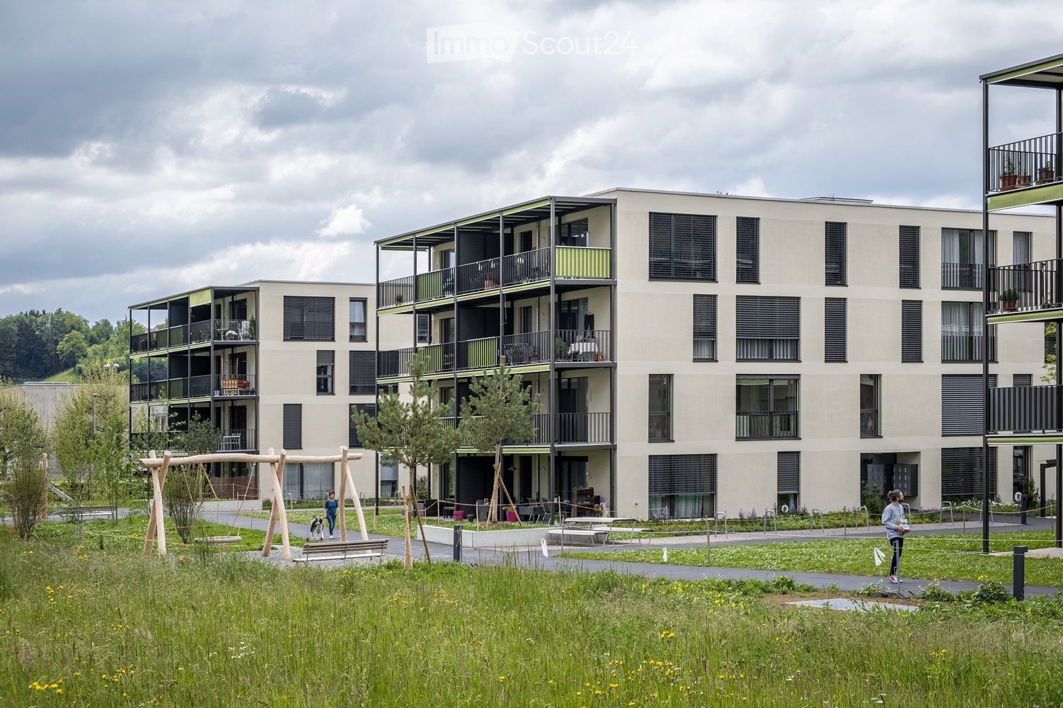 Residential building, multiple floors, balconies, modern architecture