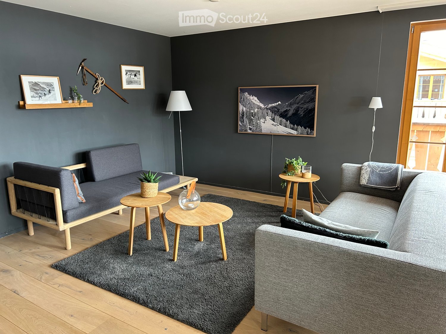 2 sofas, 3 tables, rug, framed pictures, lamp