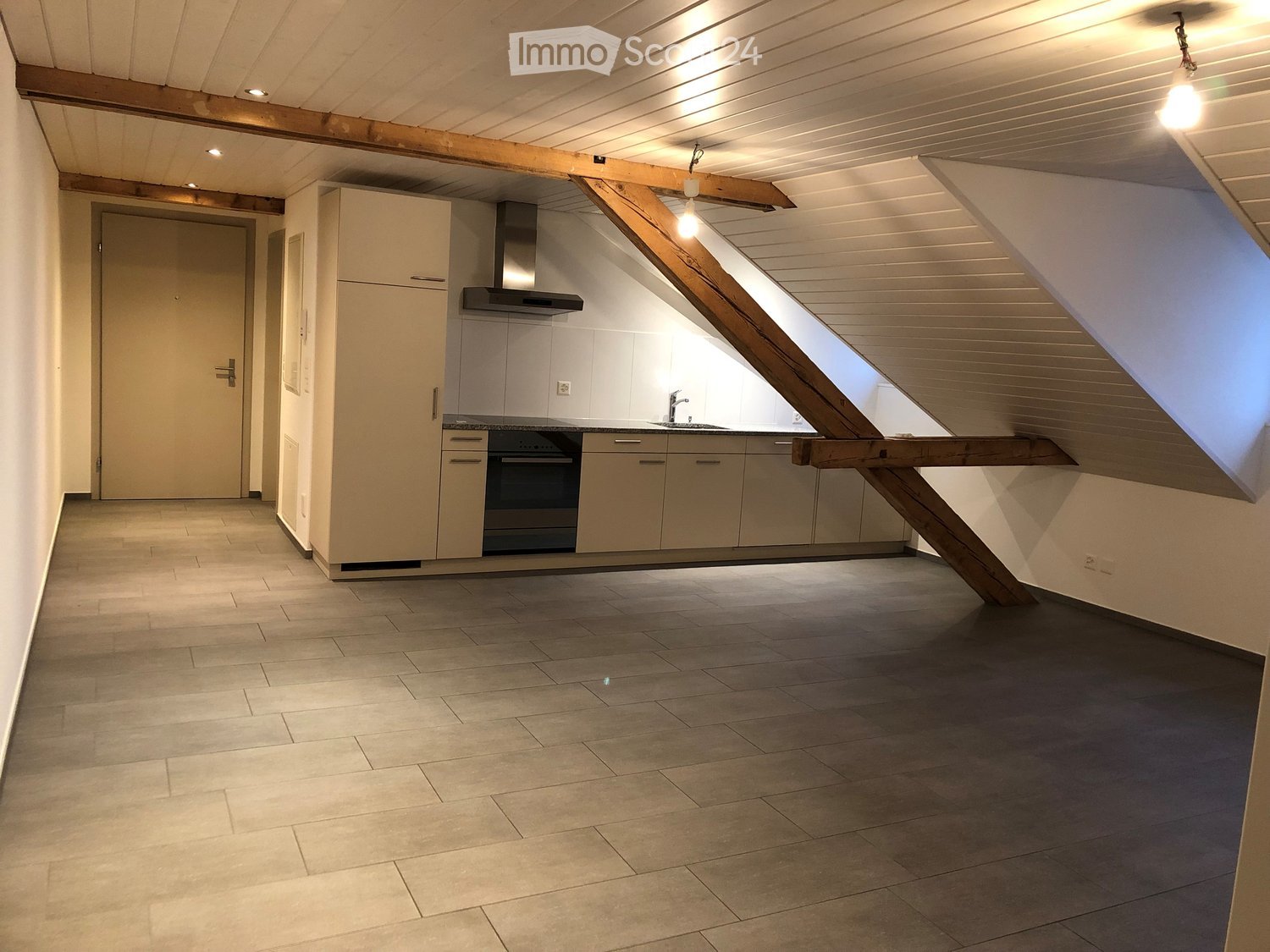 open kitchen, wooden beams, kitchen with stove and sink, entrance door