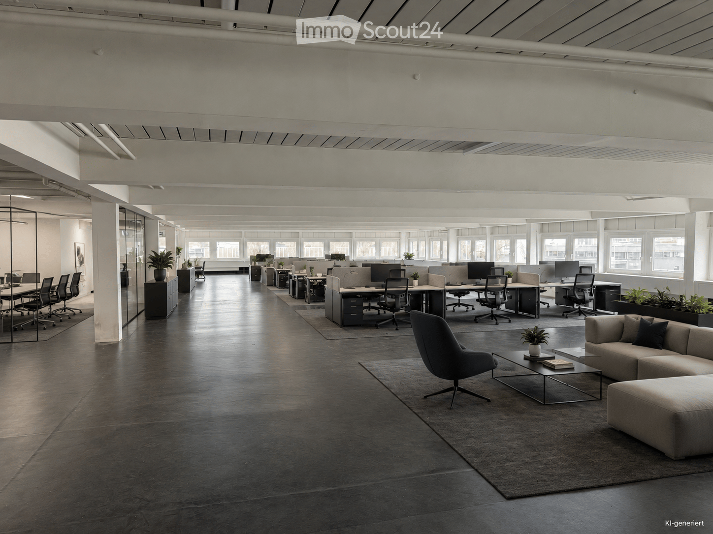 Modern office space with open-plan workstations, desks, chairs, and a lounge area featuring a sofa, coffee table, and chairs.