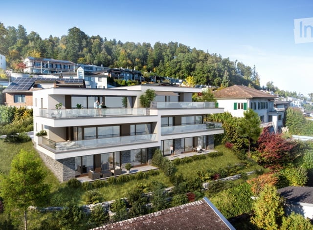 3 story house, glass balcony, solar panels, surrounded by plants and trees