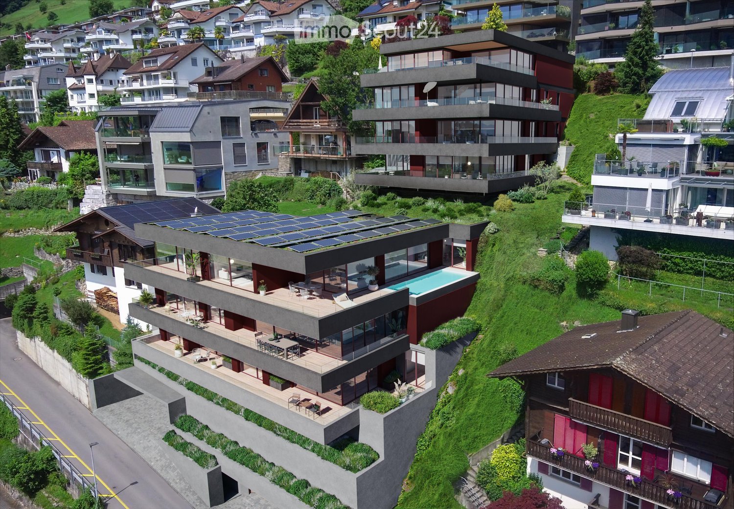 Modern multi-story house with solar panels, swimming pool, terraces, and balconies