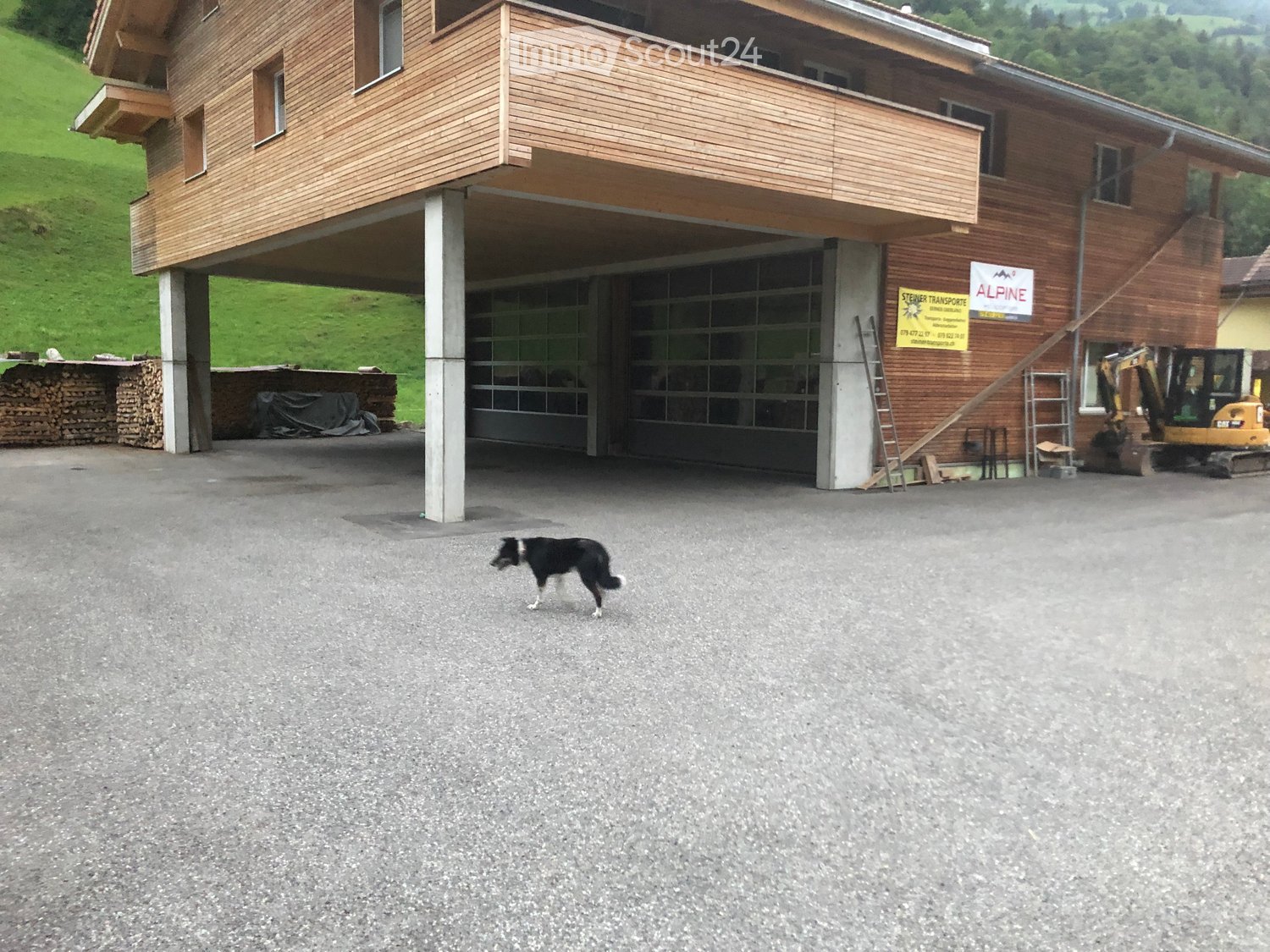 wooden exterior, balcony, garage, large driveway