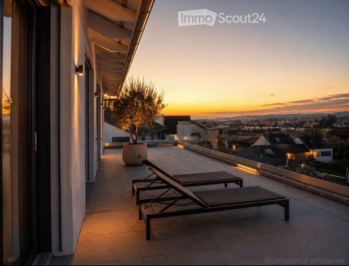 Modern rooftop terrace with sun loungers, a small table, and a potted tree, overlooking a cityscape at sunset.